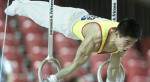Čínsky gymnasta už nemusí žobrať, dostal prácu